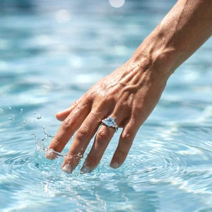 Sparkling hand with aquamarine ring