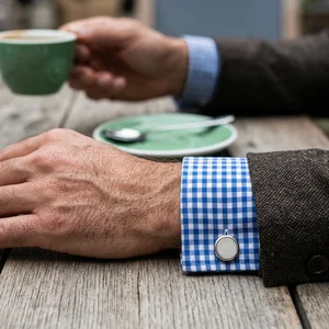 Sophisticated cufflink on tweed