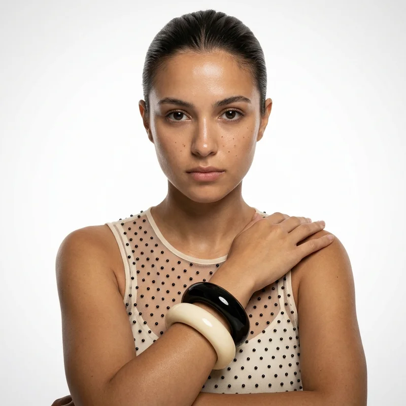 Bold chunky bangles on model