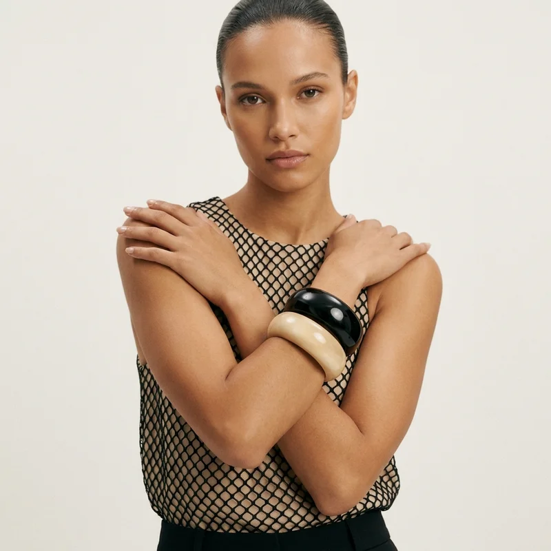 Modern chunky bangles on model