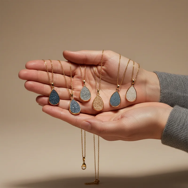 Teardrop necklace collection in hand