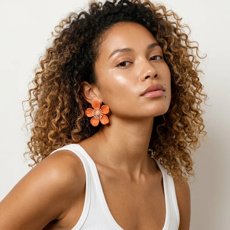 Bold flower earring on model