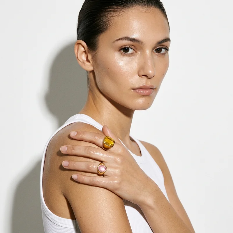 Luxury gem rings on model