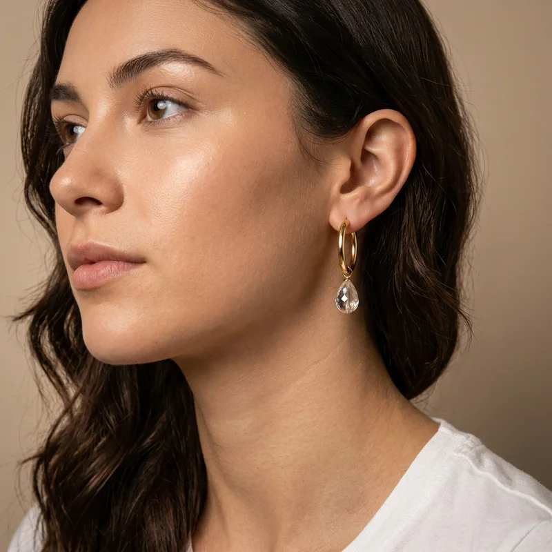 Elegant teardrop earring on model