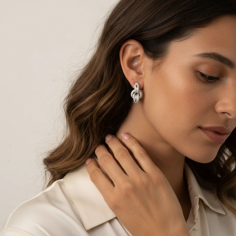 Elegant diamond knot earring on model