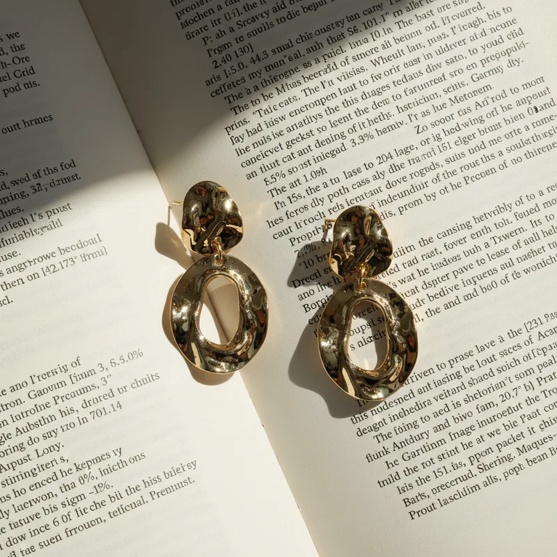 Artisan gold statement earrings