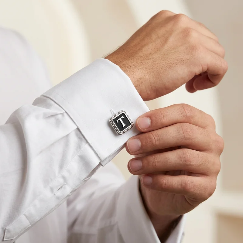 Elegant initial cufflink on model