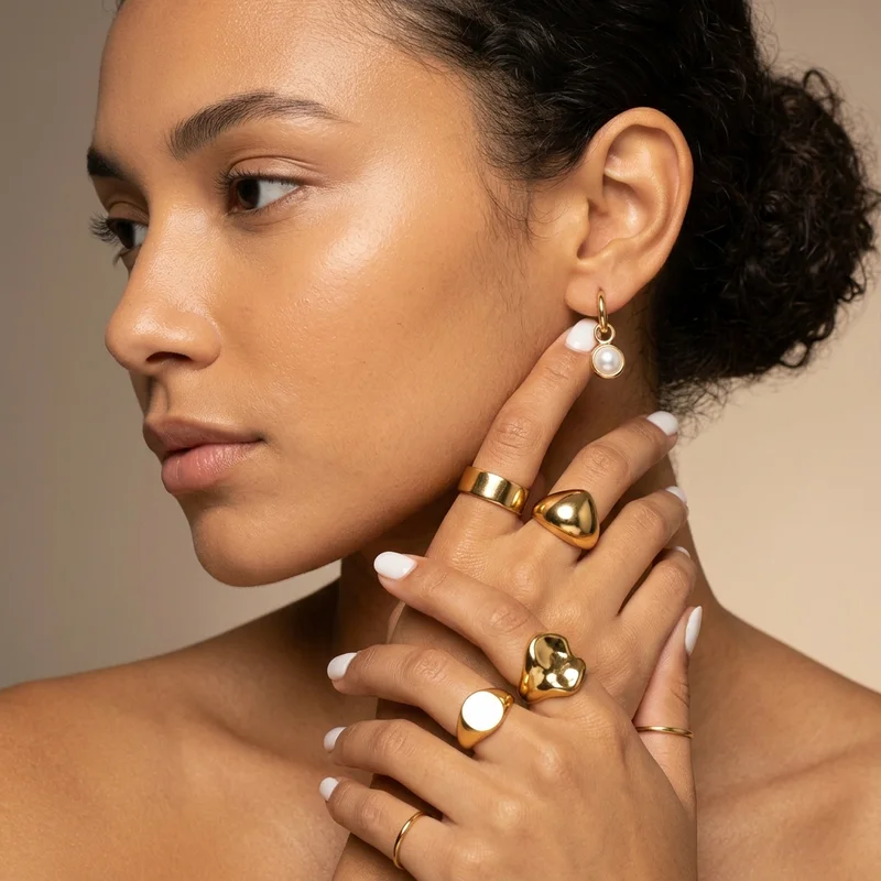 Gold jewelry on model
