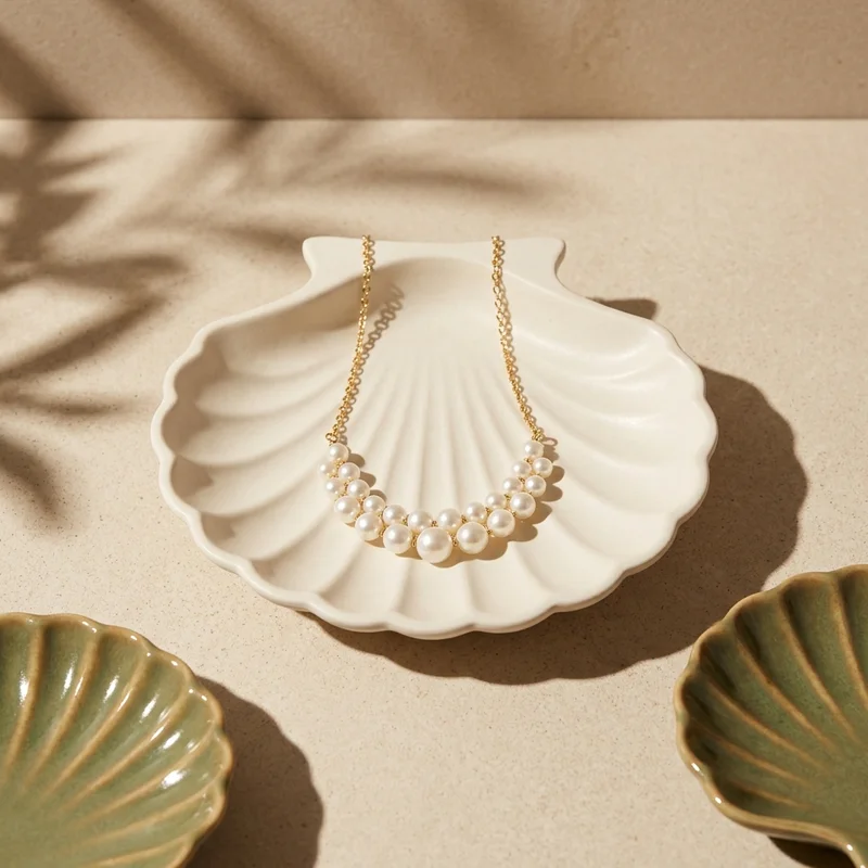 Pearl necklace in concrete seashell