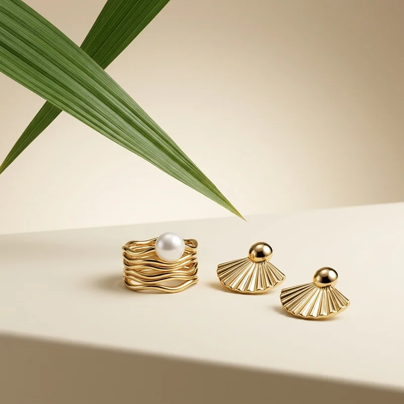 Gold jewelry with pearl and leaf