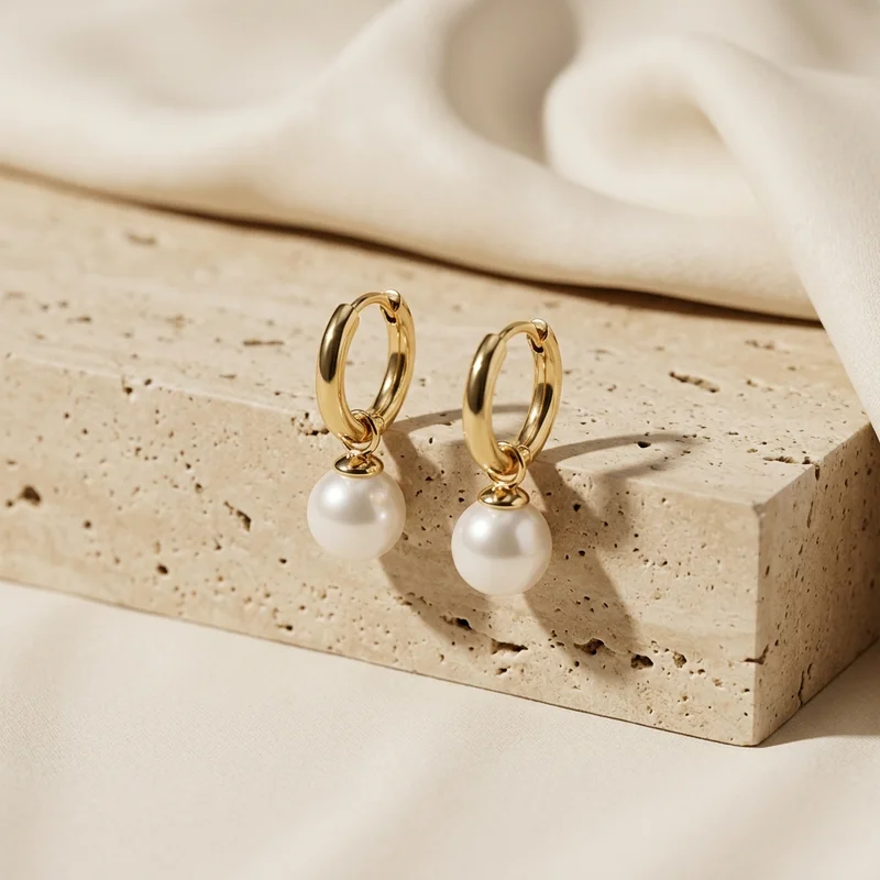Elegant pearl hoops on stone