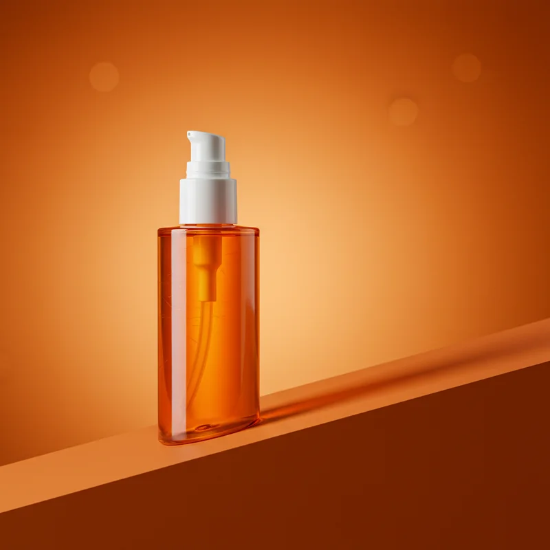 Vibrant orange skincare pump