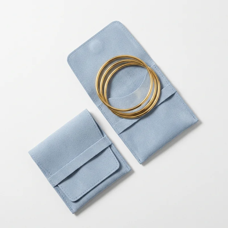 Minimalist jewelry in blue suede