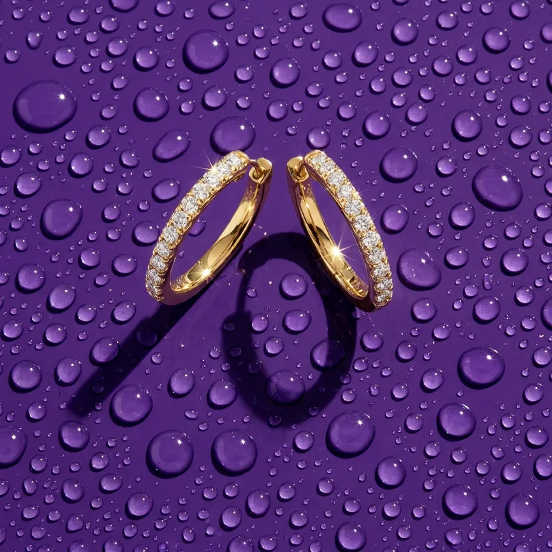 Gold diamond hoops on purple water