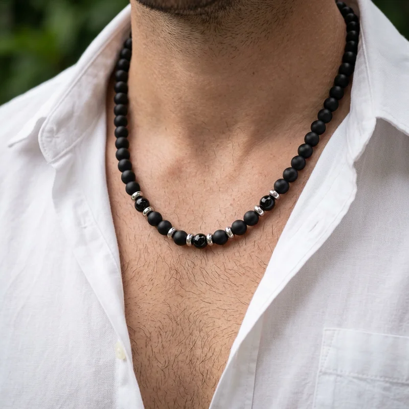 Black onyx beaded necklace on man