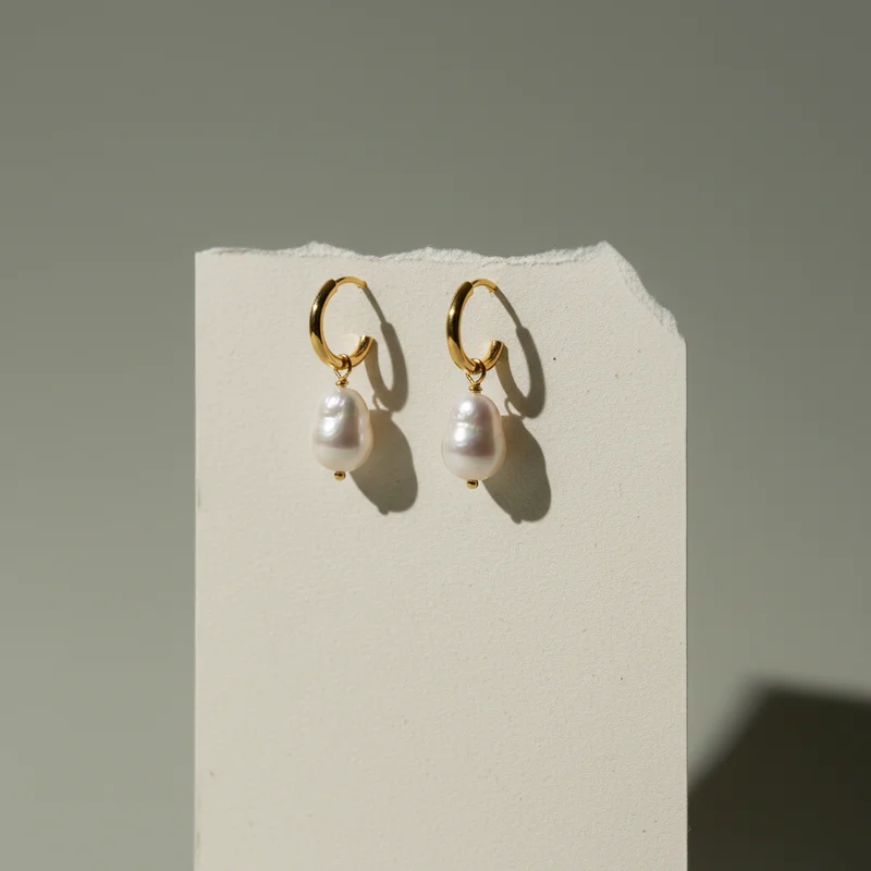 Pearl drop gold hoop earrings
