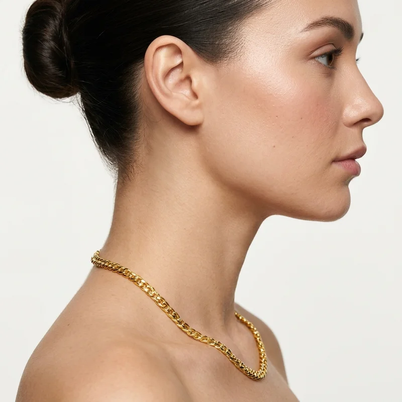 Elegant gold chain on model profile