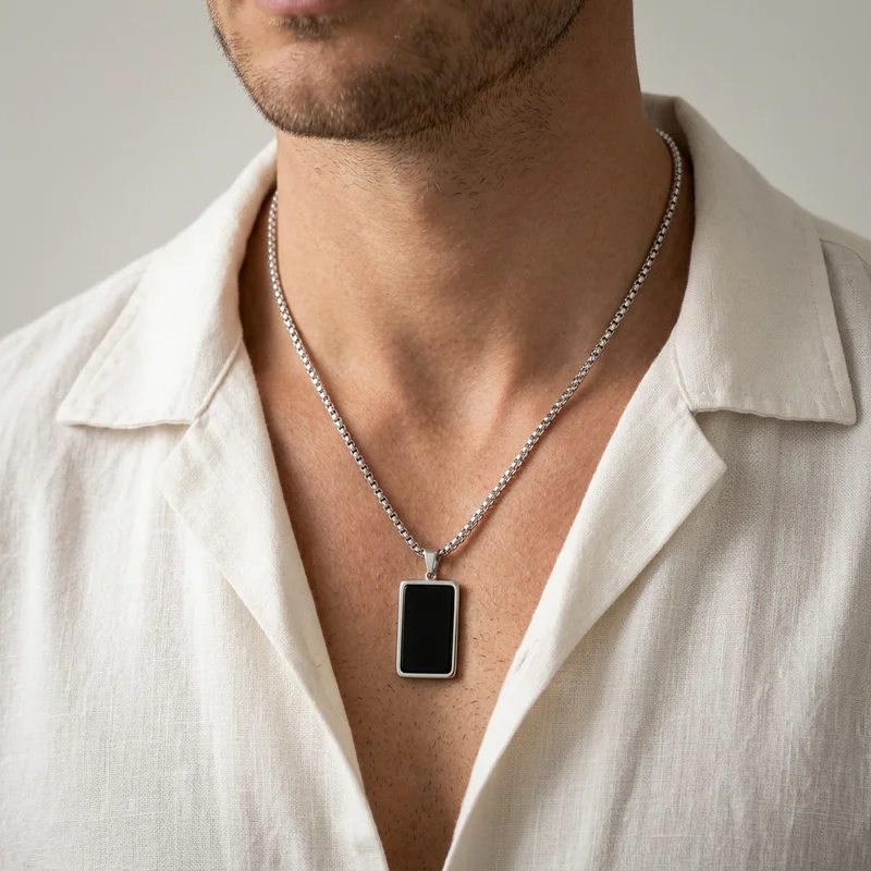 Men's black pendant on model
