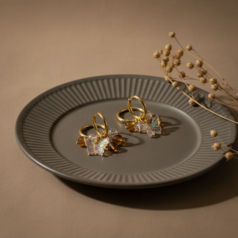 Butterfly earrings on ribbed plate
