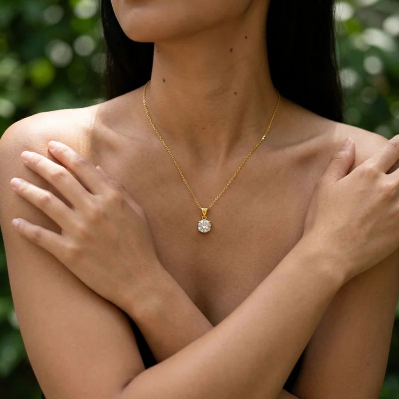 Diamond pendant on woman outdoors