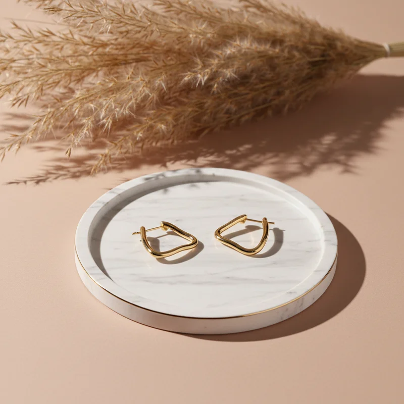 Modern gold earrings