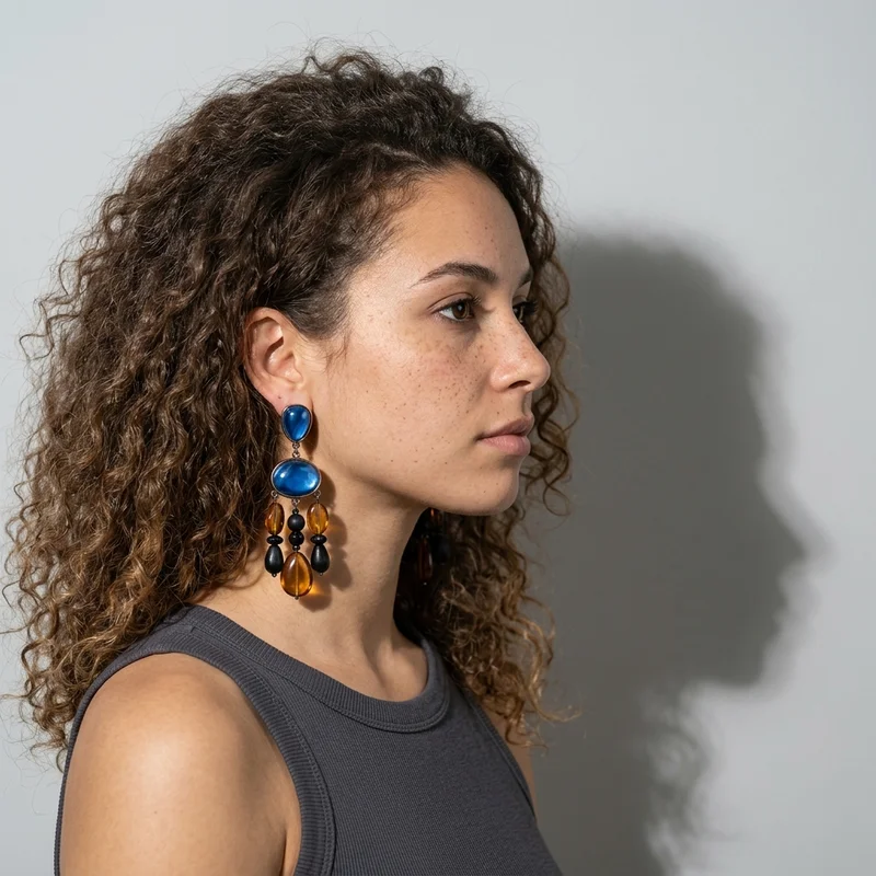 Artisan drop earrings in profile