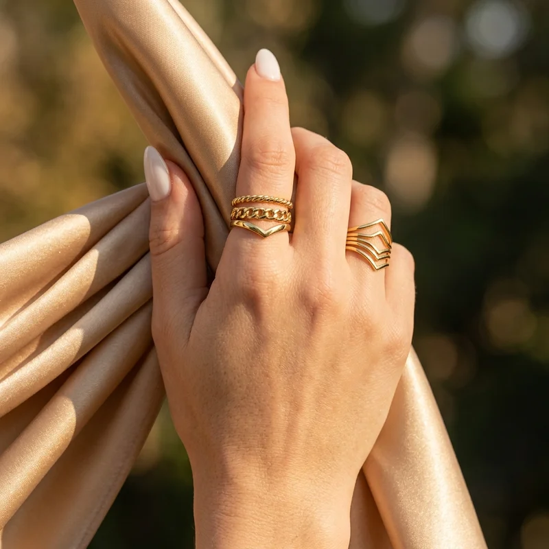 Elegant gold rings on satin