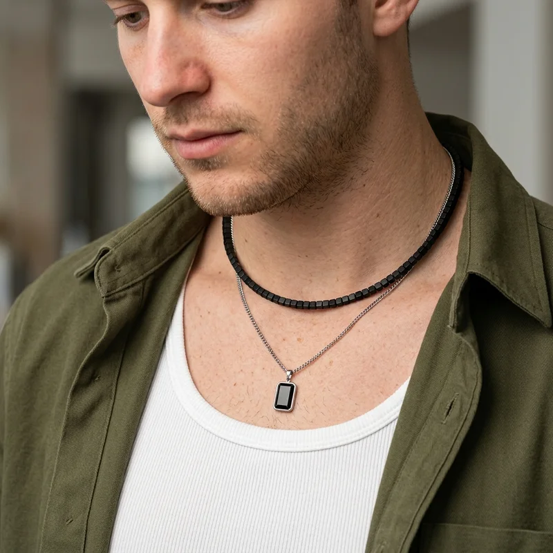 Men's layered necklaces outdoors