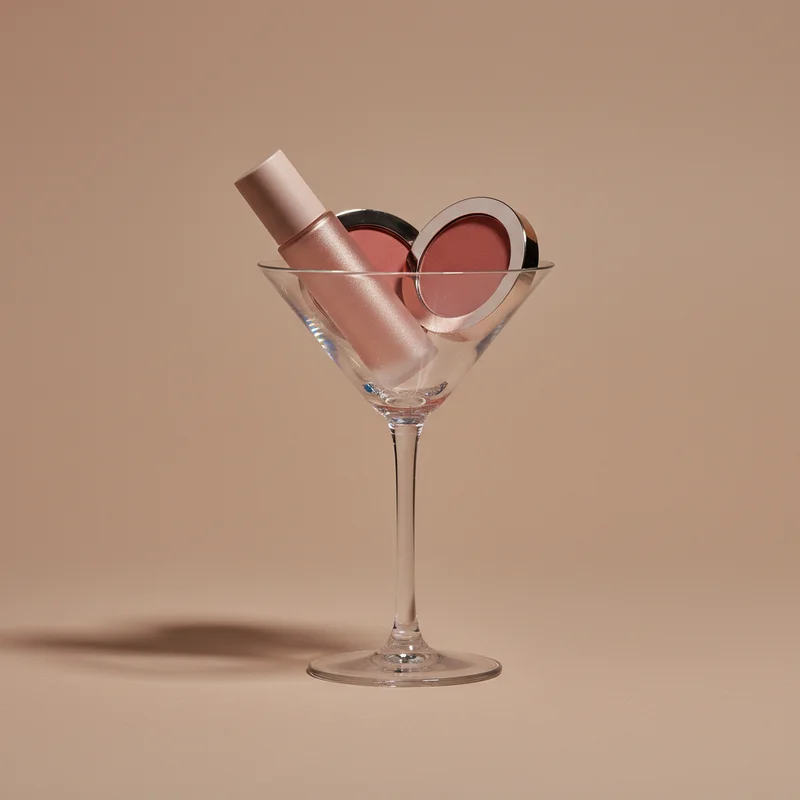 Glamorous cosmetic in martini glass