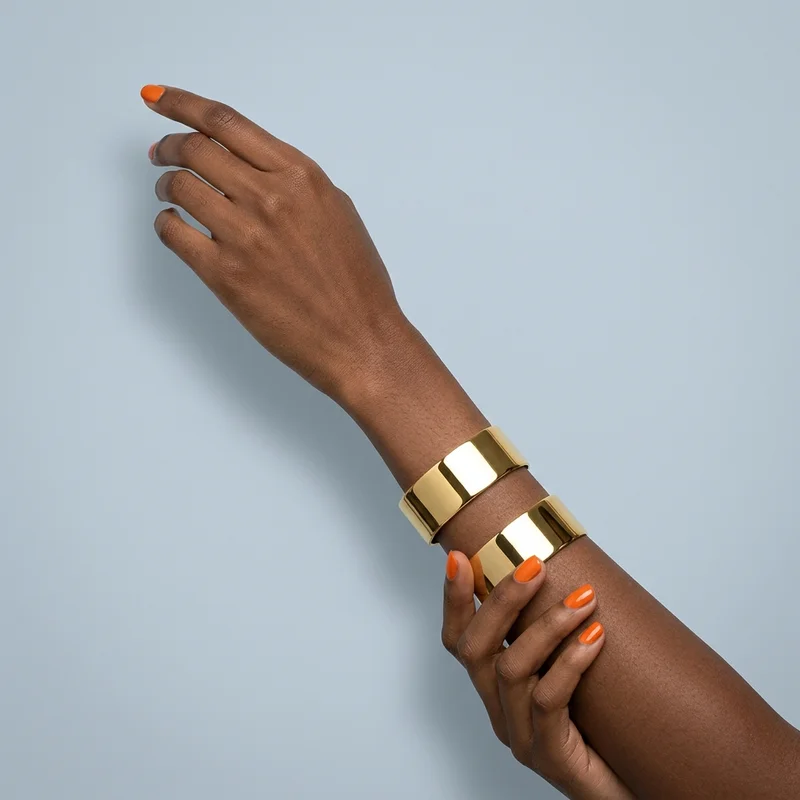 Elegant gold cuffs on model