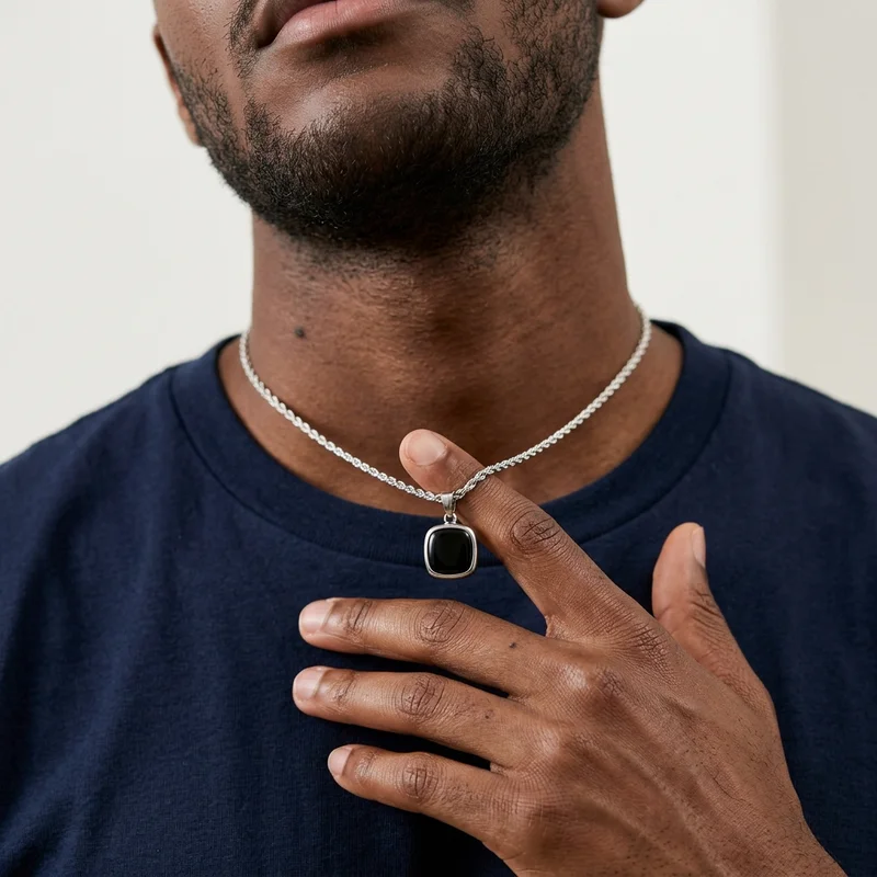Men's silver necklace on model