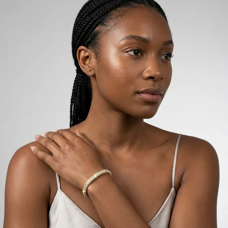 Elegant gold bracelet on model