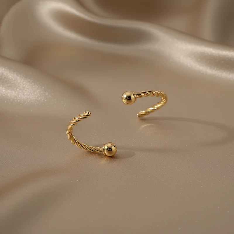 Elegant golden bangle on silk
