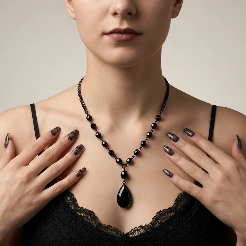 Black pendant necklace on model