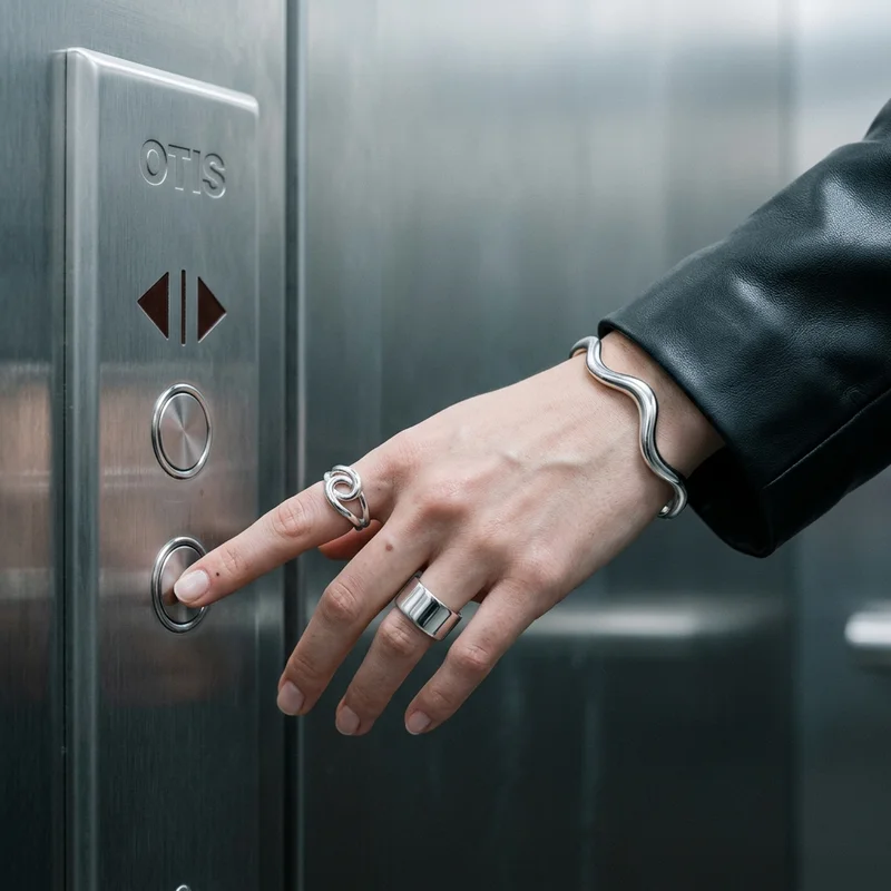 Urban silver jewelry in elevator